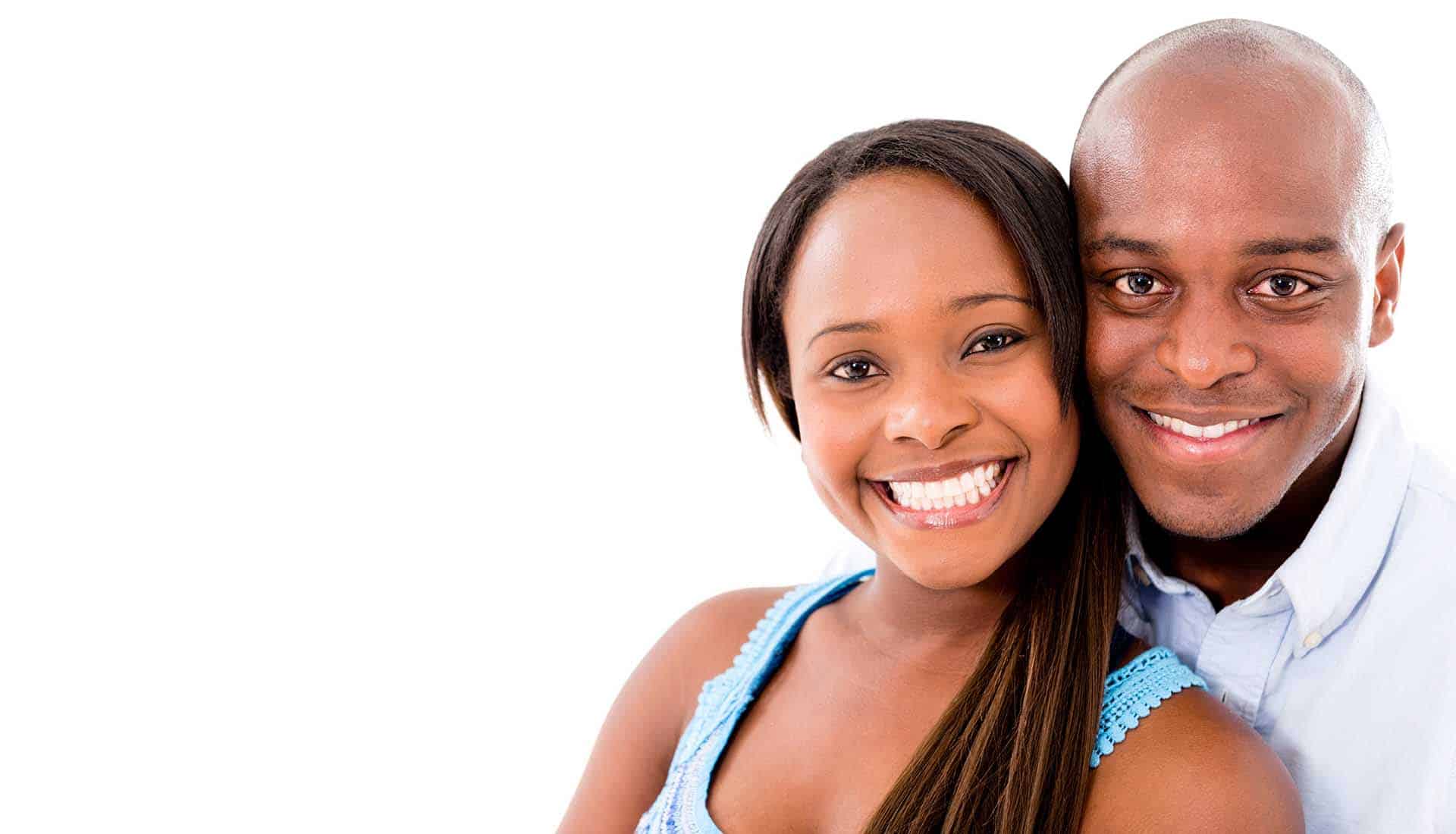 African-american couple smilling.